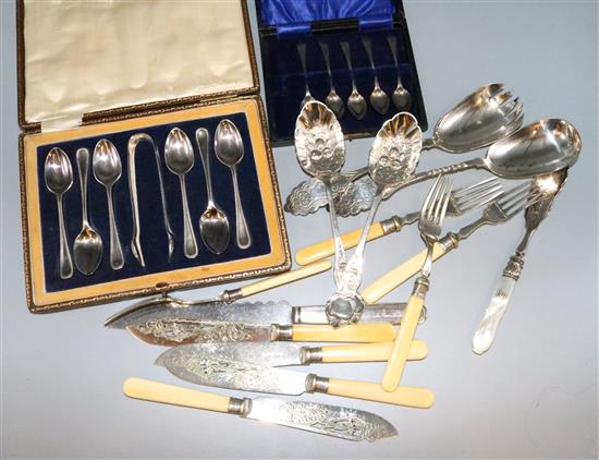 6 pairs of plated fish eaters and pair of matching servers. 4 silver coffee spoons and misc plated items